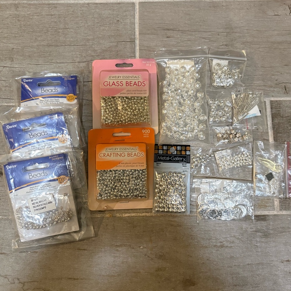 Assortment of silver beads for jewelry making and crafting